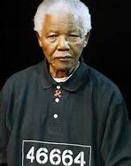 Older Nelson Mandela wearing prison number